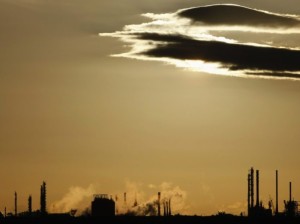 Steam and other emissions are emitted from funnels at a chemical manufacturing facility in Melbourne